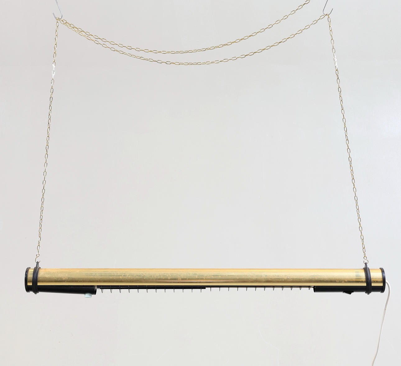 A 20th-century “Tubmodell” ceiling lamp.