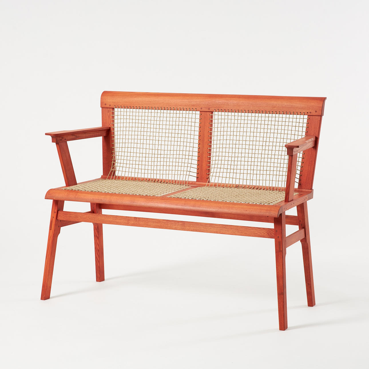 THOMAS TEMPTE. Sofa, frame in ash, linseed lacquer in red, braided seat and back.