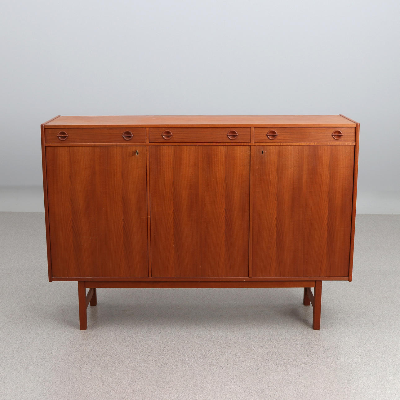 SIDEBOARD. It's teak. 1960s.