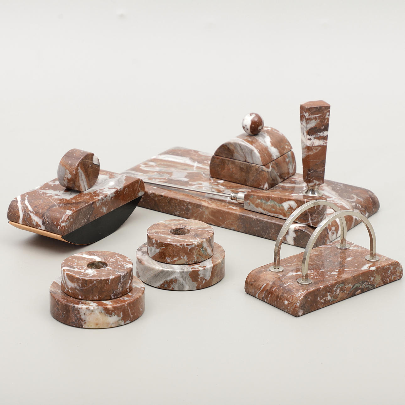 A 7-piece marble table set, mid 20th century.