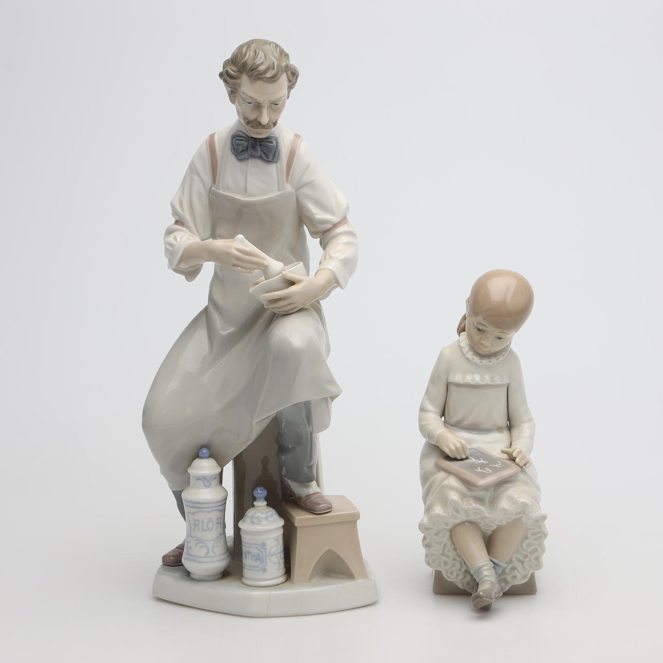 FIGURINER, 2 stycken, porslin, Lladro samt Nau, Spanien.