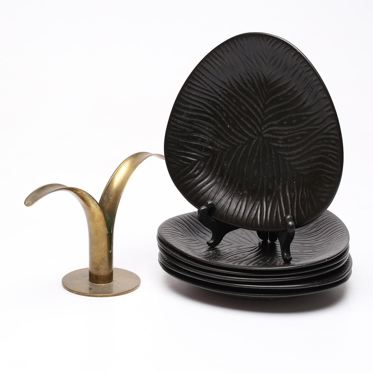 A set of 6 candles and a brass candlestick, Ystad Metall.