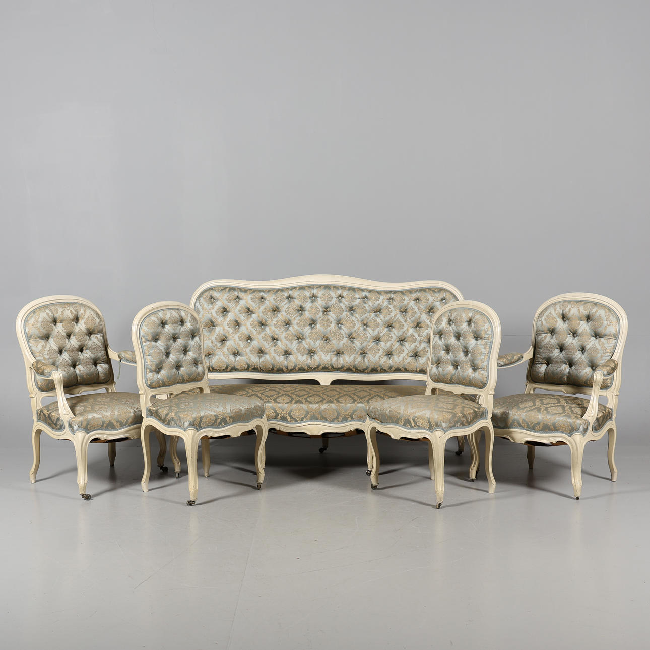A 5-piece rococo seating area.