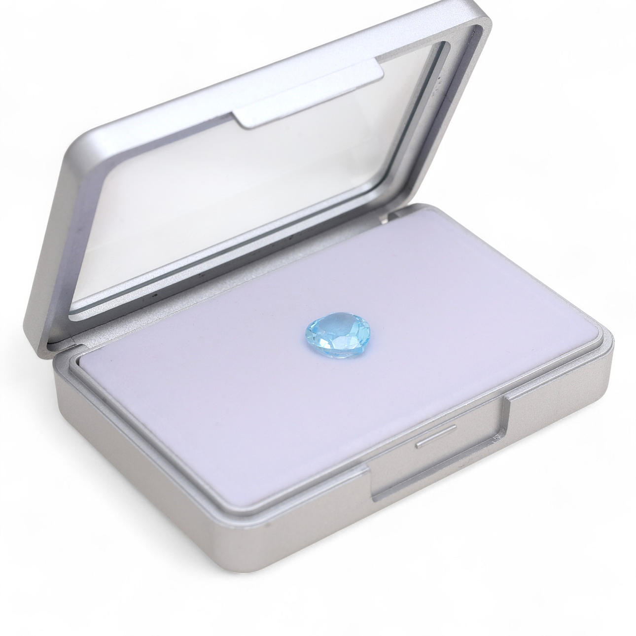 Unmounted topaz with certificate.