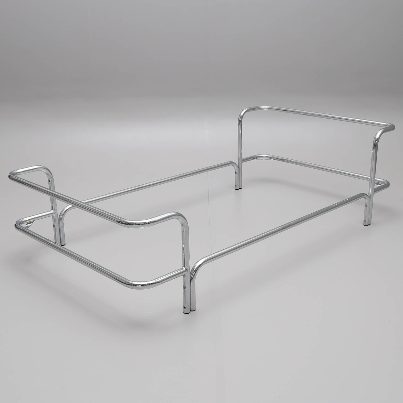 A bed frame, chrome-plated steel, 1970/80s.