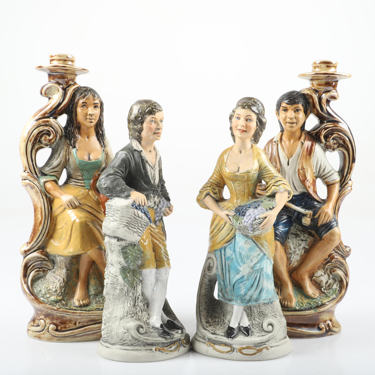FIGURINES/CANDLESTICKS, 4 pieces, ceramic, fl. a. Capodimonte, Italy.