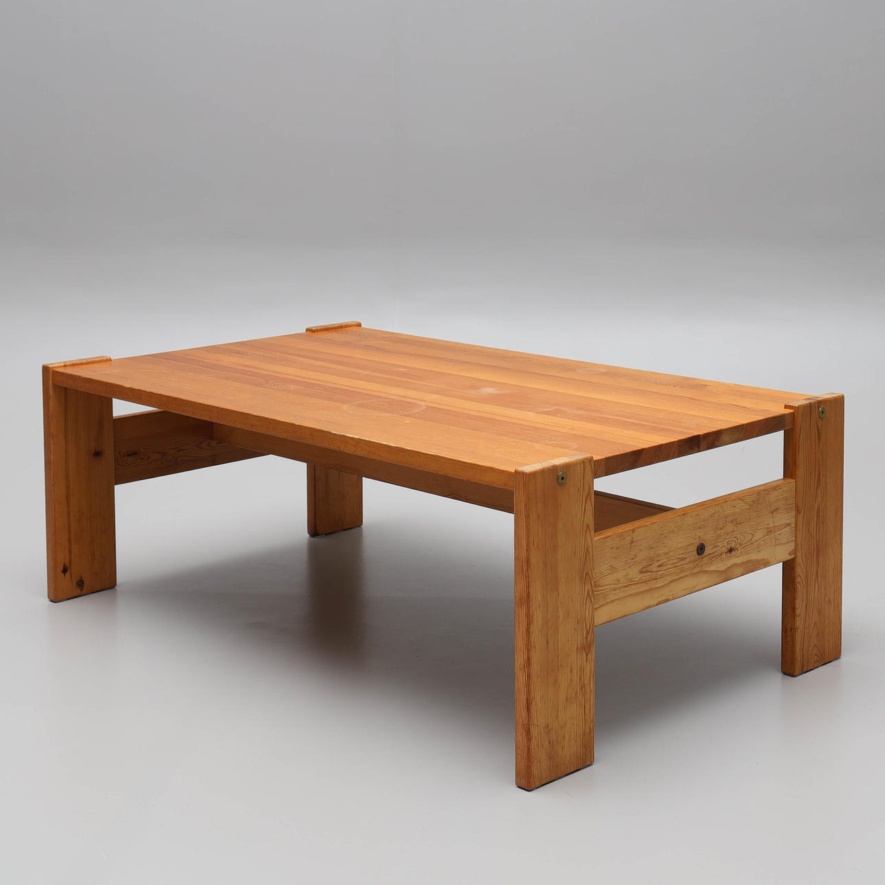 A 1970's solid pine coffee table.