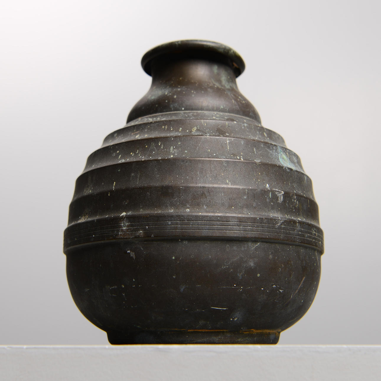 A bronze globe vase, SvM Needlework, 1930s/40s.
