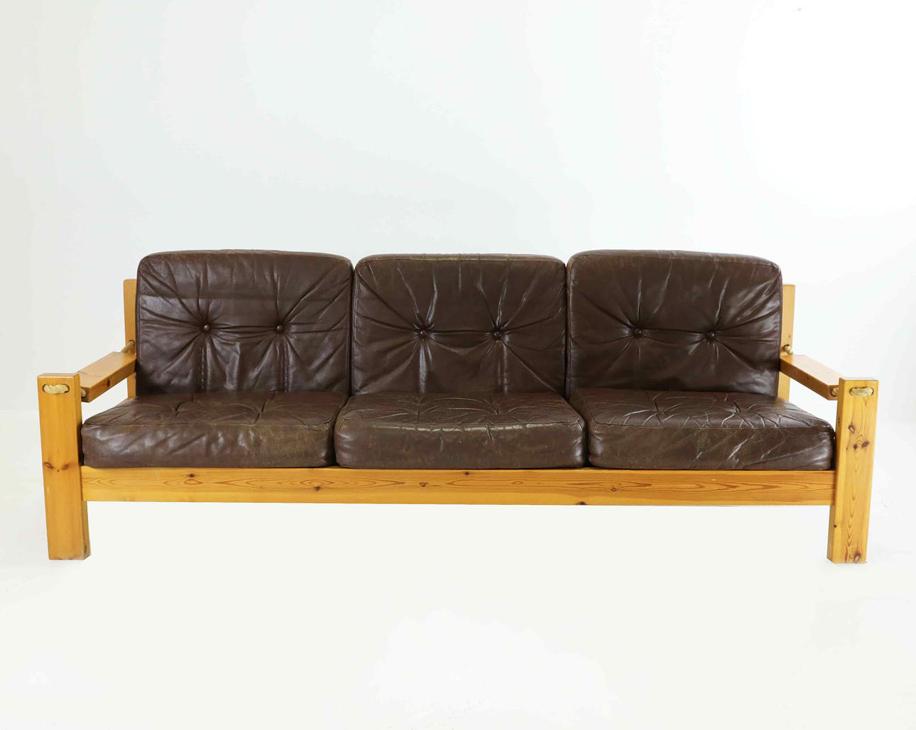 A 3-seater sofa, pine and leather, 1970s.