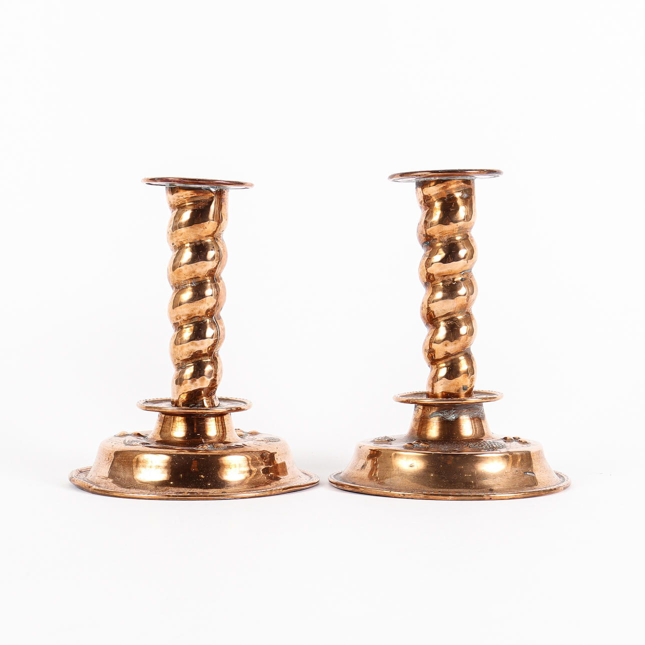 A pair of 19th century copper candlesticks.