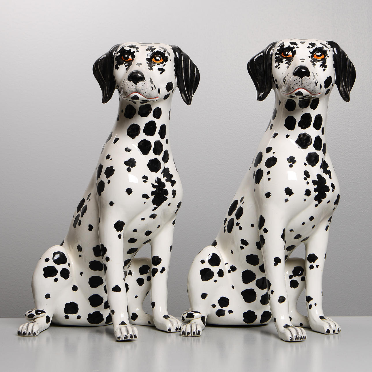 Two large Dalmatian figurines, porcelain, Italy.