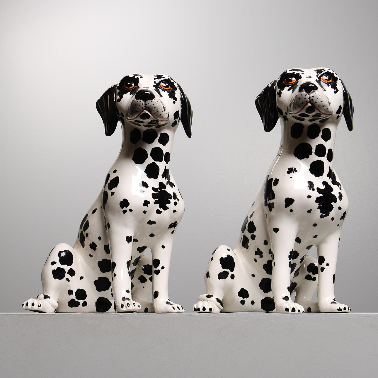 Two Dalmatian figurines, porcelain, Italy.