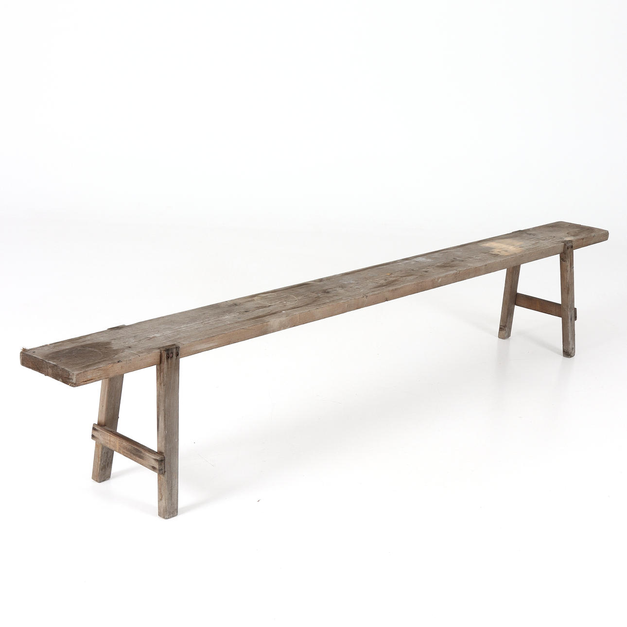 A 20th century pine bench.