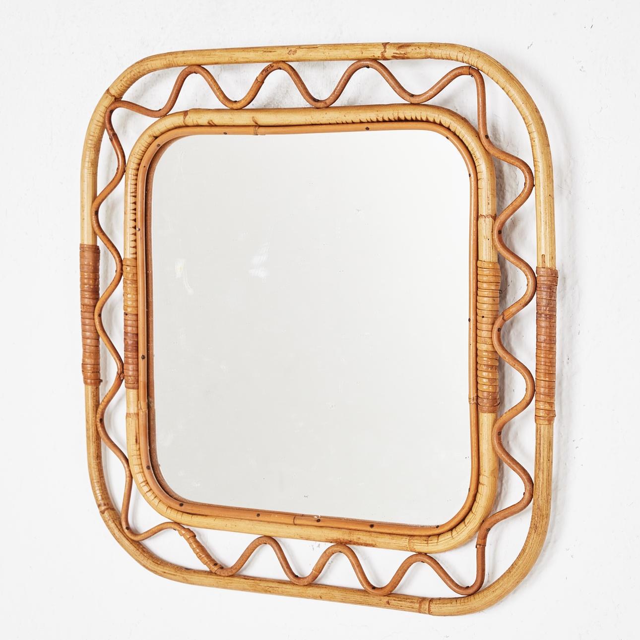 A mirror, circa 1940's, frame in rattan, Swedish modern.