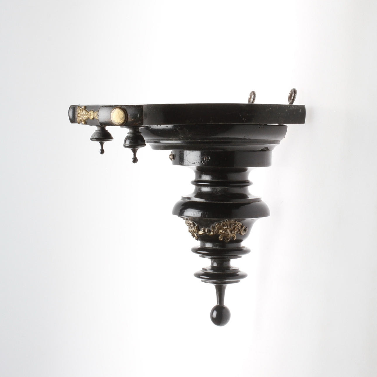 KONSOL, omkring 1900.