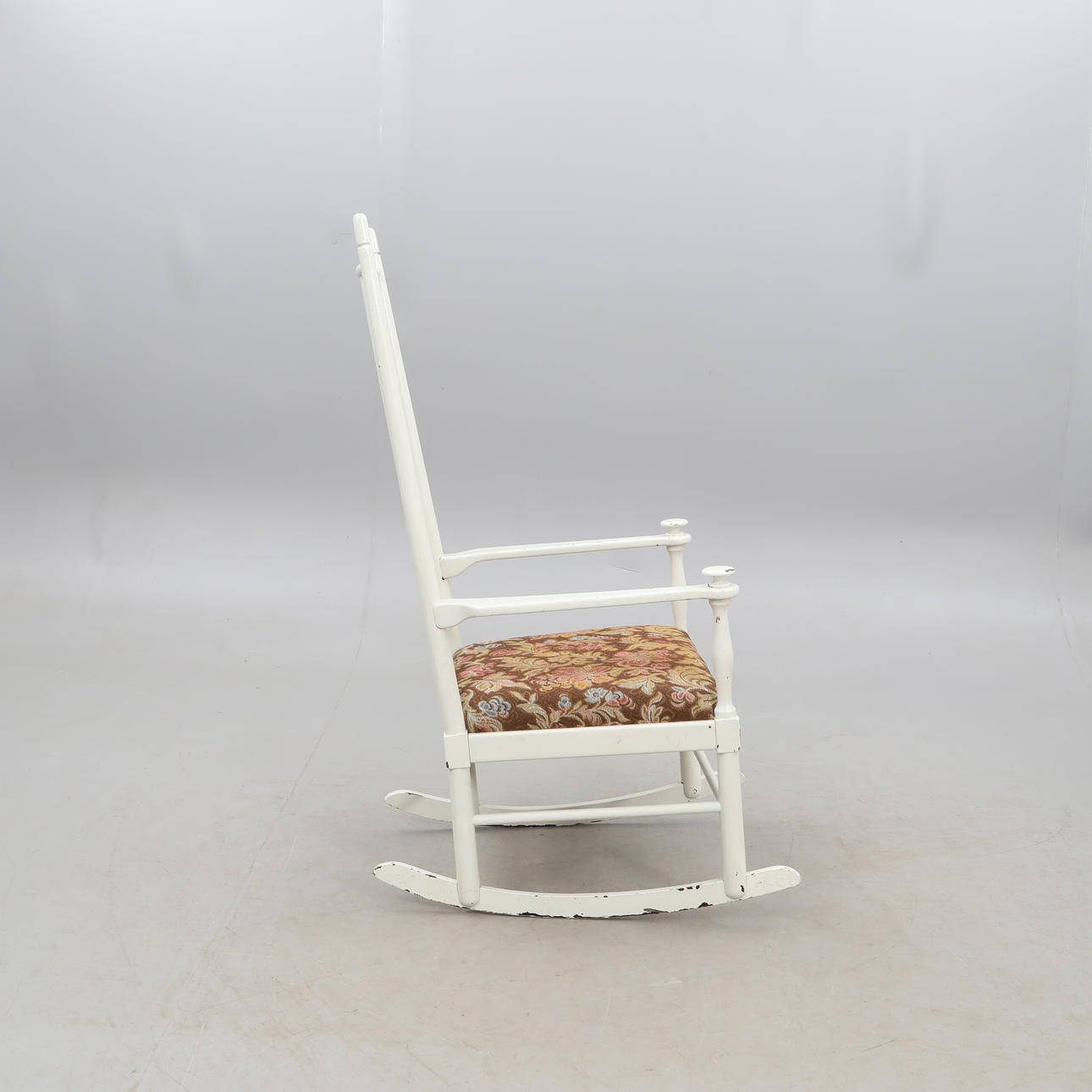 A “Isabella” rocking chair by Karl-Axel Adolfsson, Gemla, second half of the 20th century. as well as a pillared table.