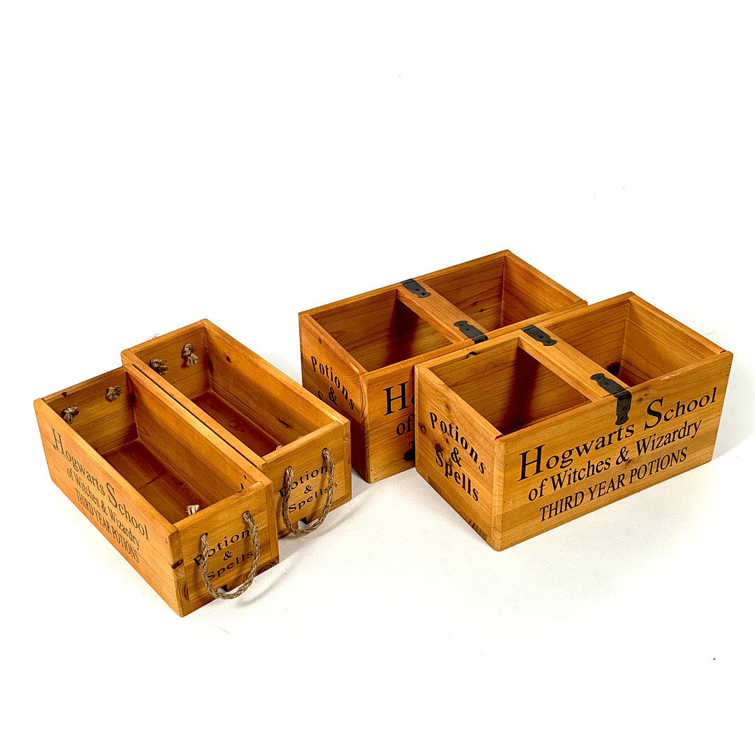 FOUR HARRY POTTER INSPIRED WOODEN BOXES.