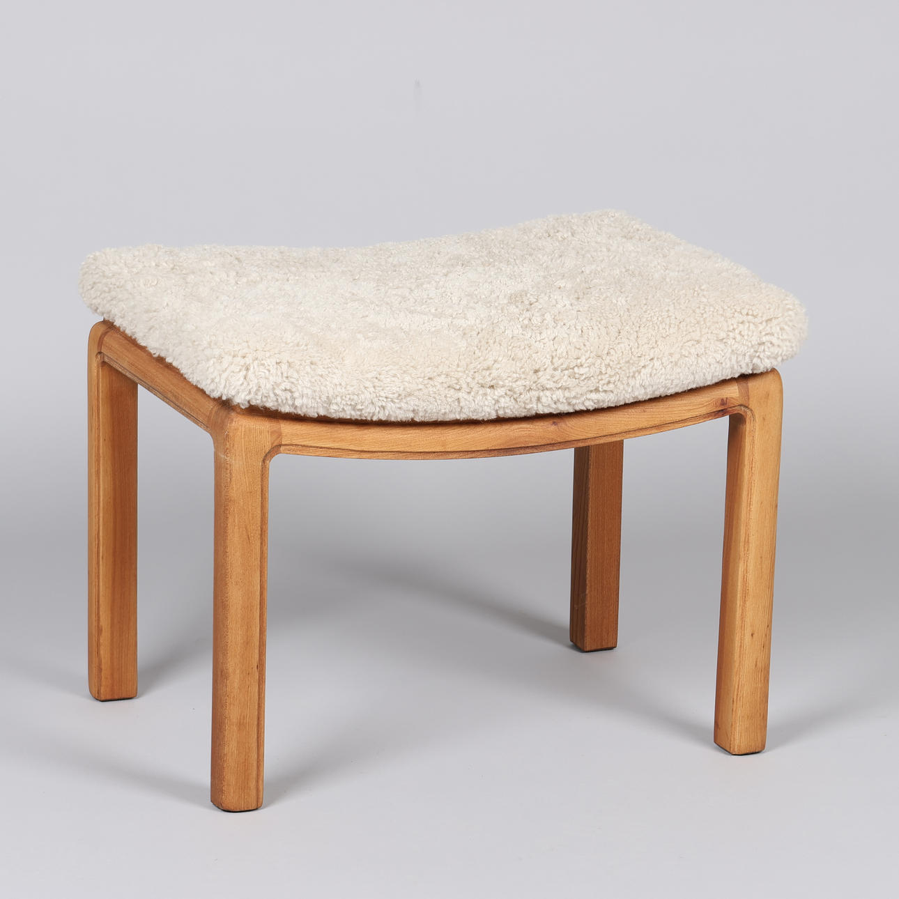 DANSK SNEDKERMESTER. Stool made of elm, seat newly upholstered with lambswool, Denmark, circa 1940s.