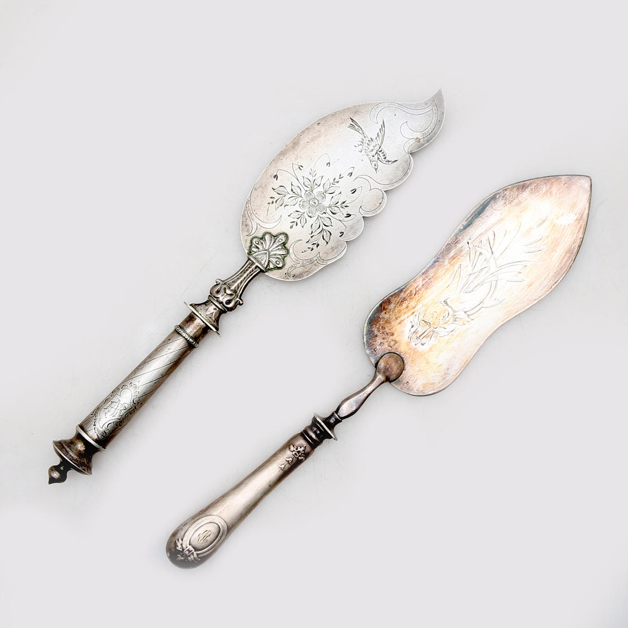 Two silver and silver plated serving spoons, 20th Century.