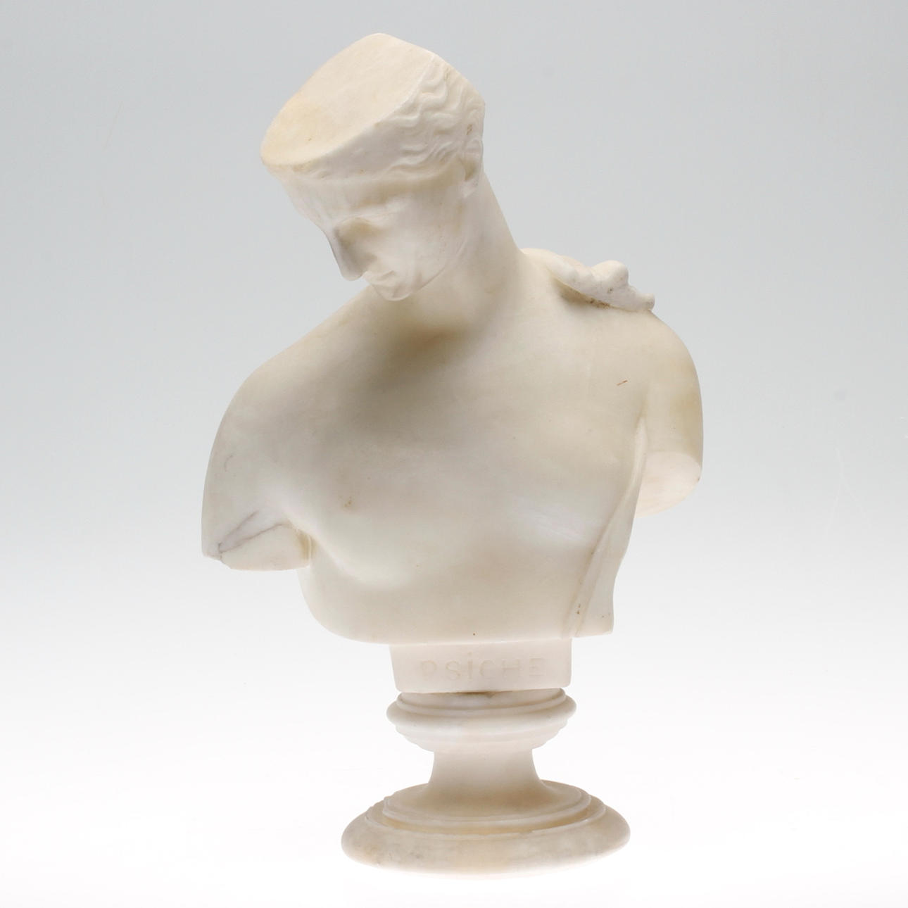 CARIN NILSON(1884-1973). TILLSKRIVEN. "Psiche". Skulptur, byst, marmor, osignerad.