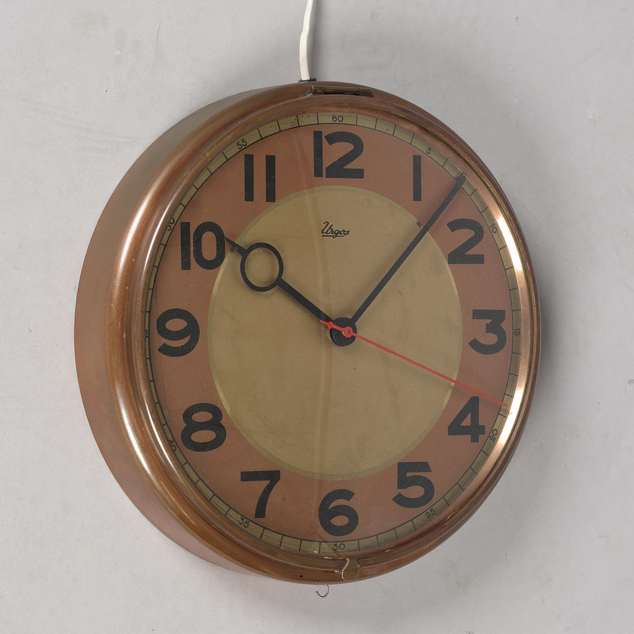 URGOS, copper electric wall clock, mid 1900's.