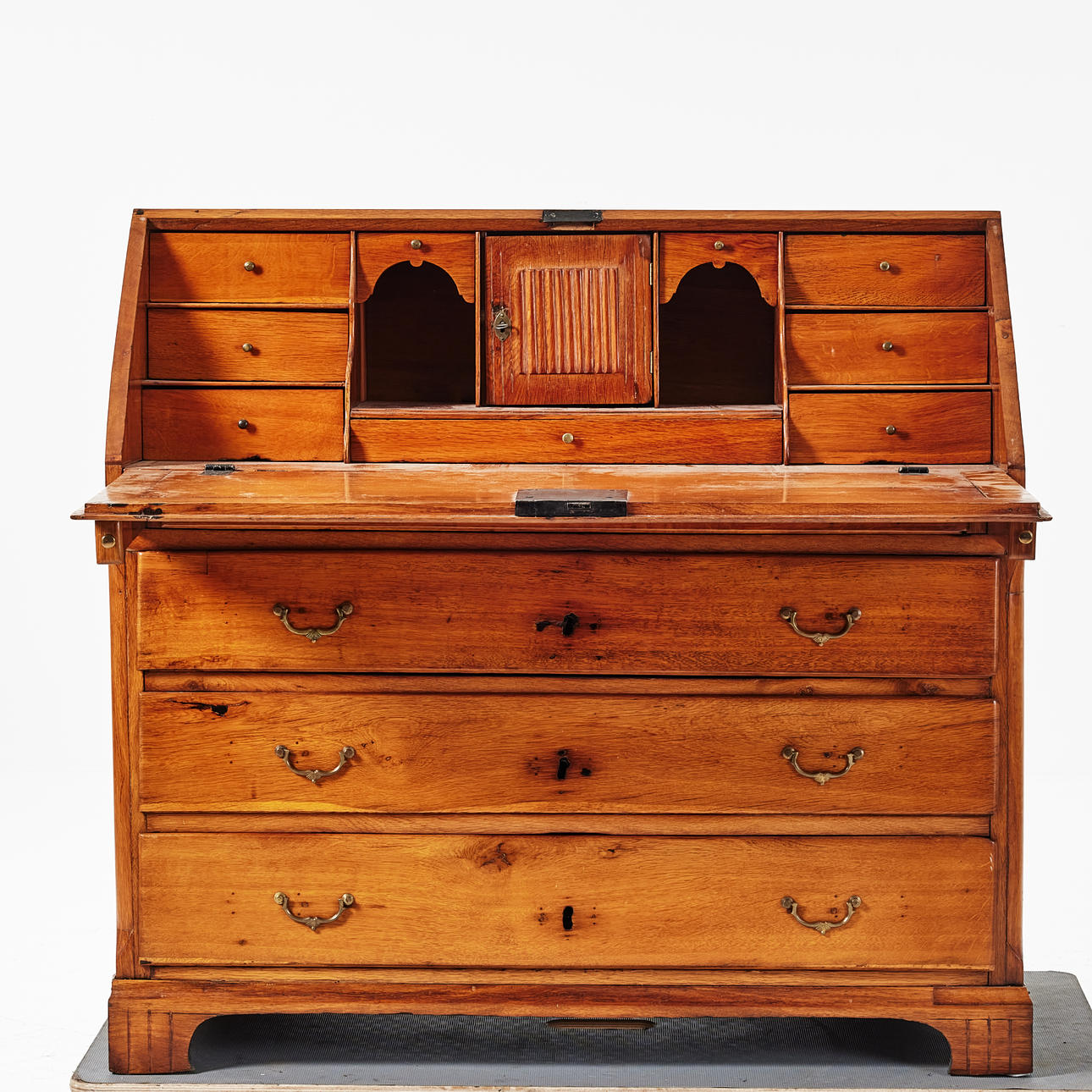 A mid 19th century oak writing desk.