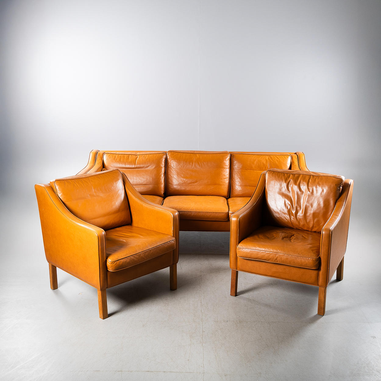 A 3-piece sofa set, removable leather upholstery, late 20th century.