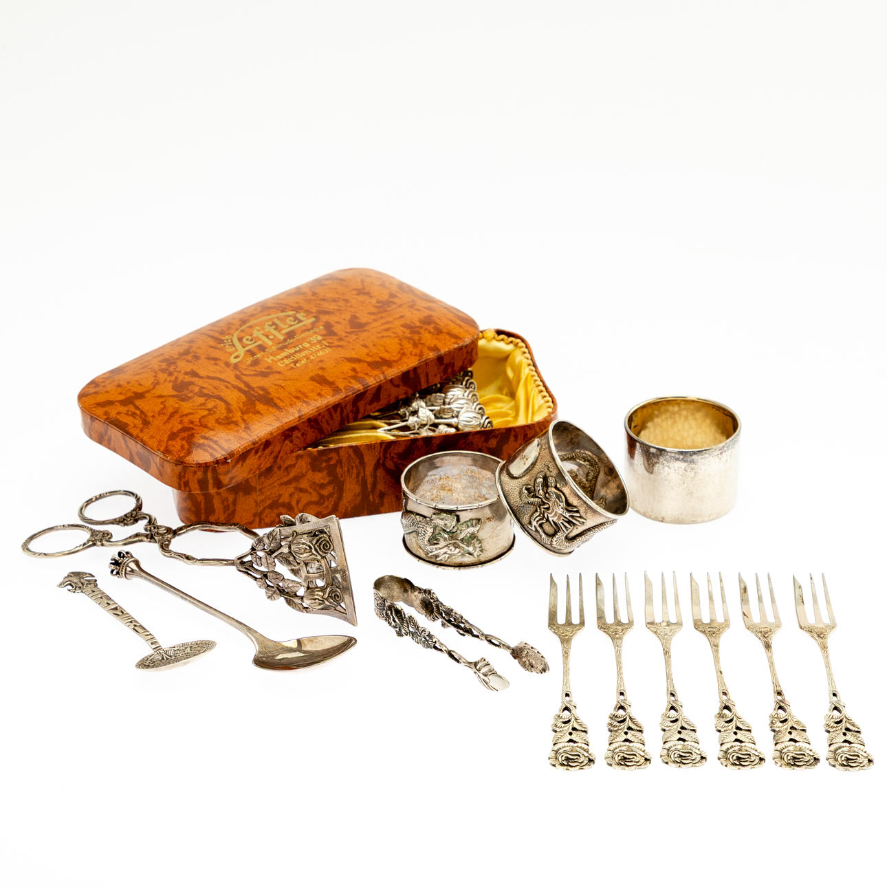 Samling af sølvtøj og tre servietringe, sølv (19).