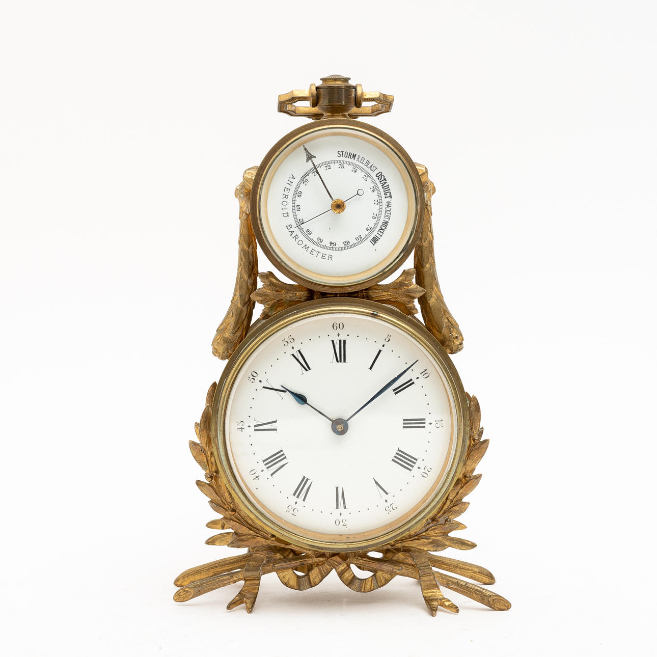 Tischuhr aus Messing mit Barometer, um 1900.