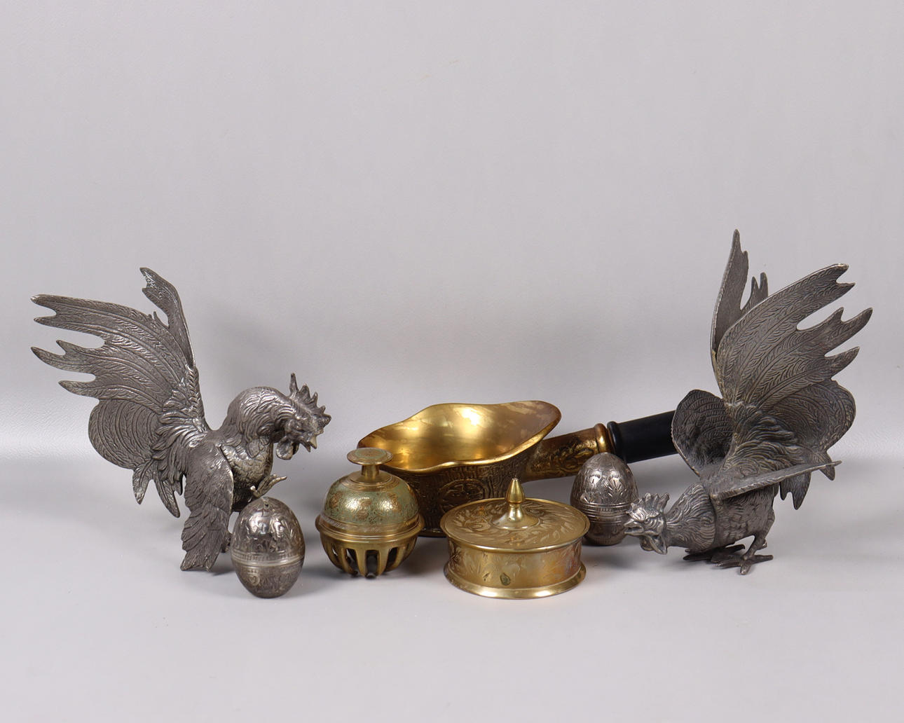 MISCELLANEOUS METAL OBJECTS, table decorations, salt pans, IRONS for silk etc., white metal and brass, 7 pieces.