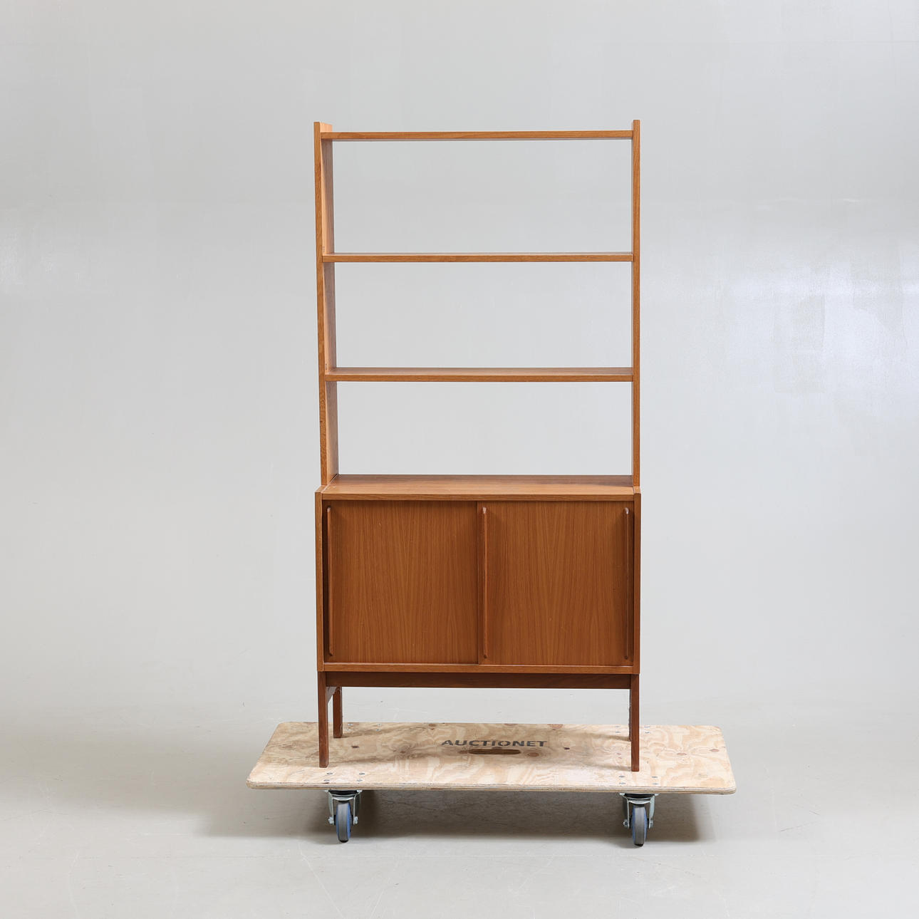 A teak bookcase, 20th century.