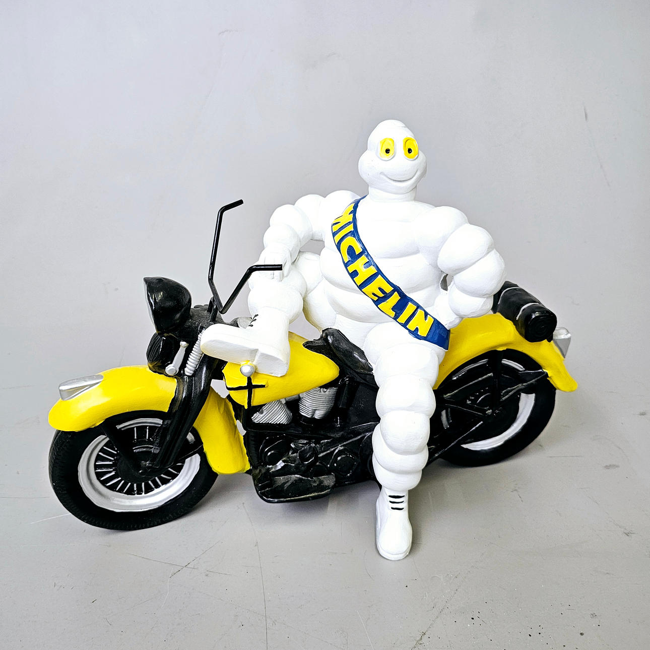 MICHELLIN DOLL ON A MOTORCYCLE.