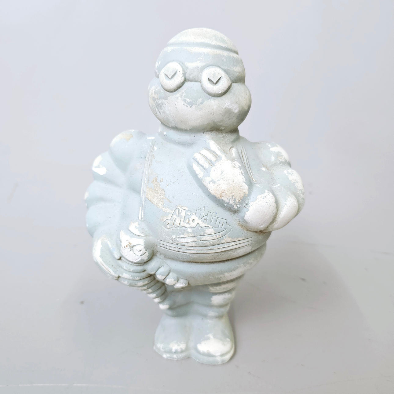 MICHELLIN DOLL WITH BABY MICHELLIN. CERAMIC. C. 1950S.