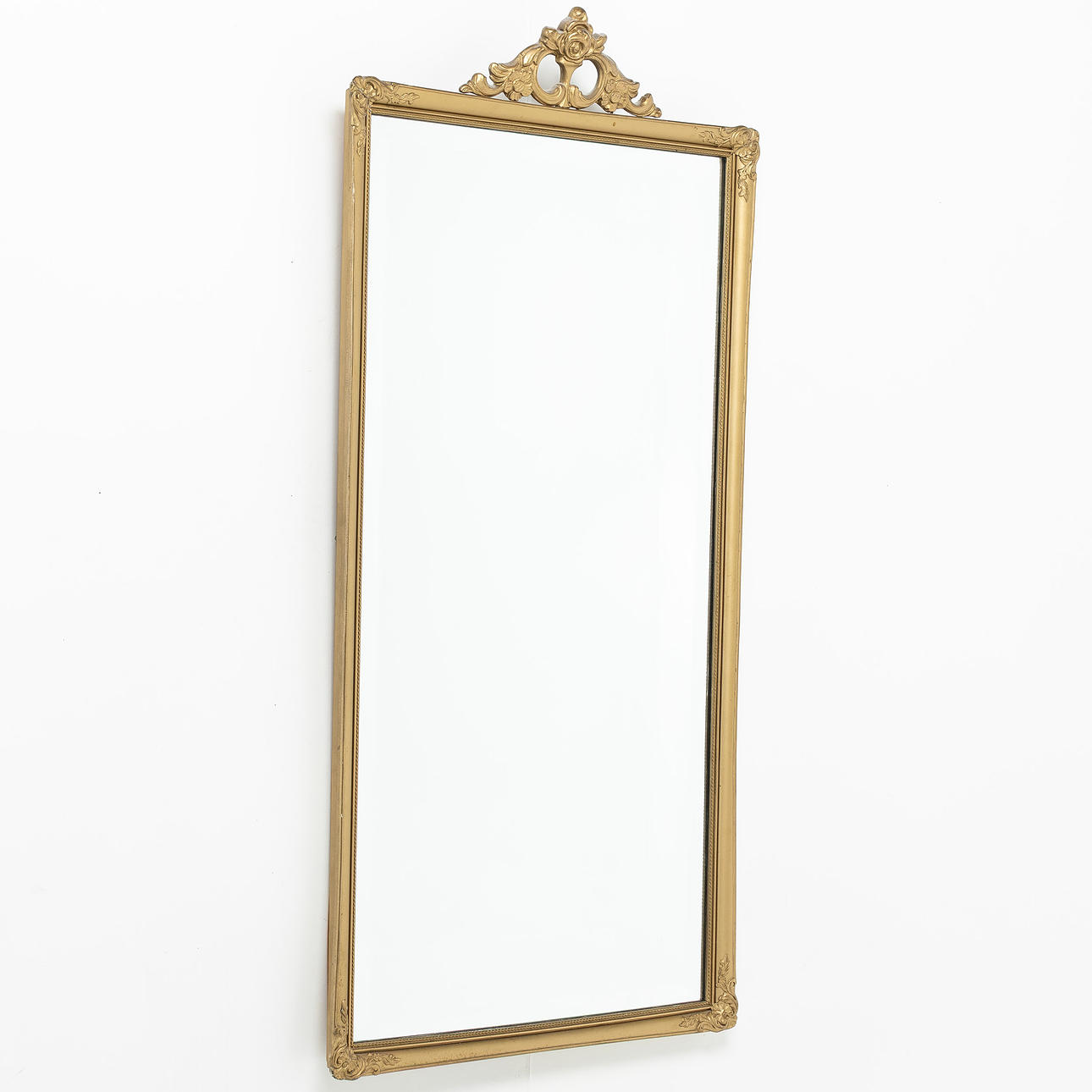 A gold coloured mirror, 1940 - numbers.