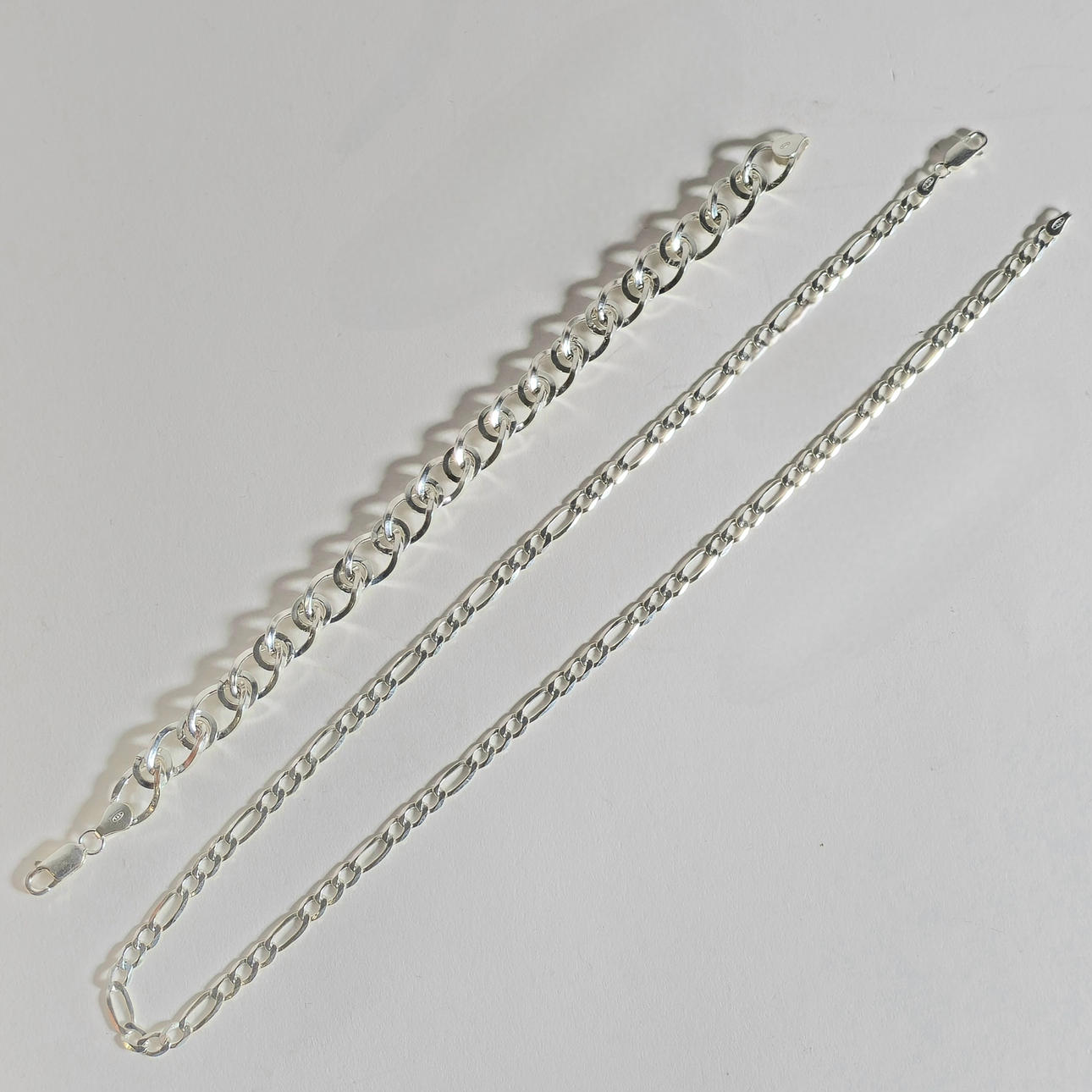 SILBERARMBAND UND GLIEDERKETTE.