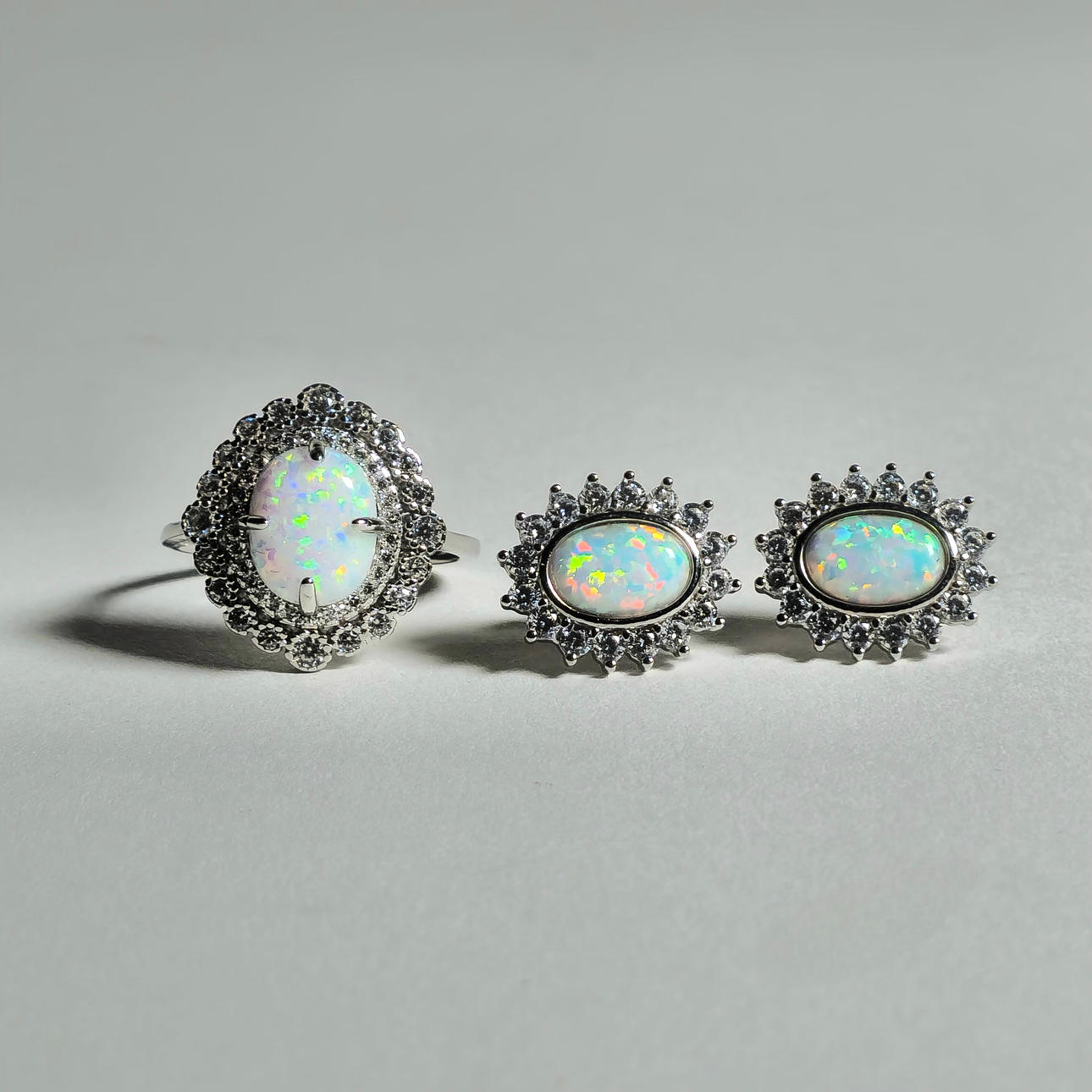 SILVER RING AND EARRINGS WITH ETHIOPIAN OPAL AND ZIRCONS.