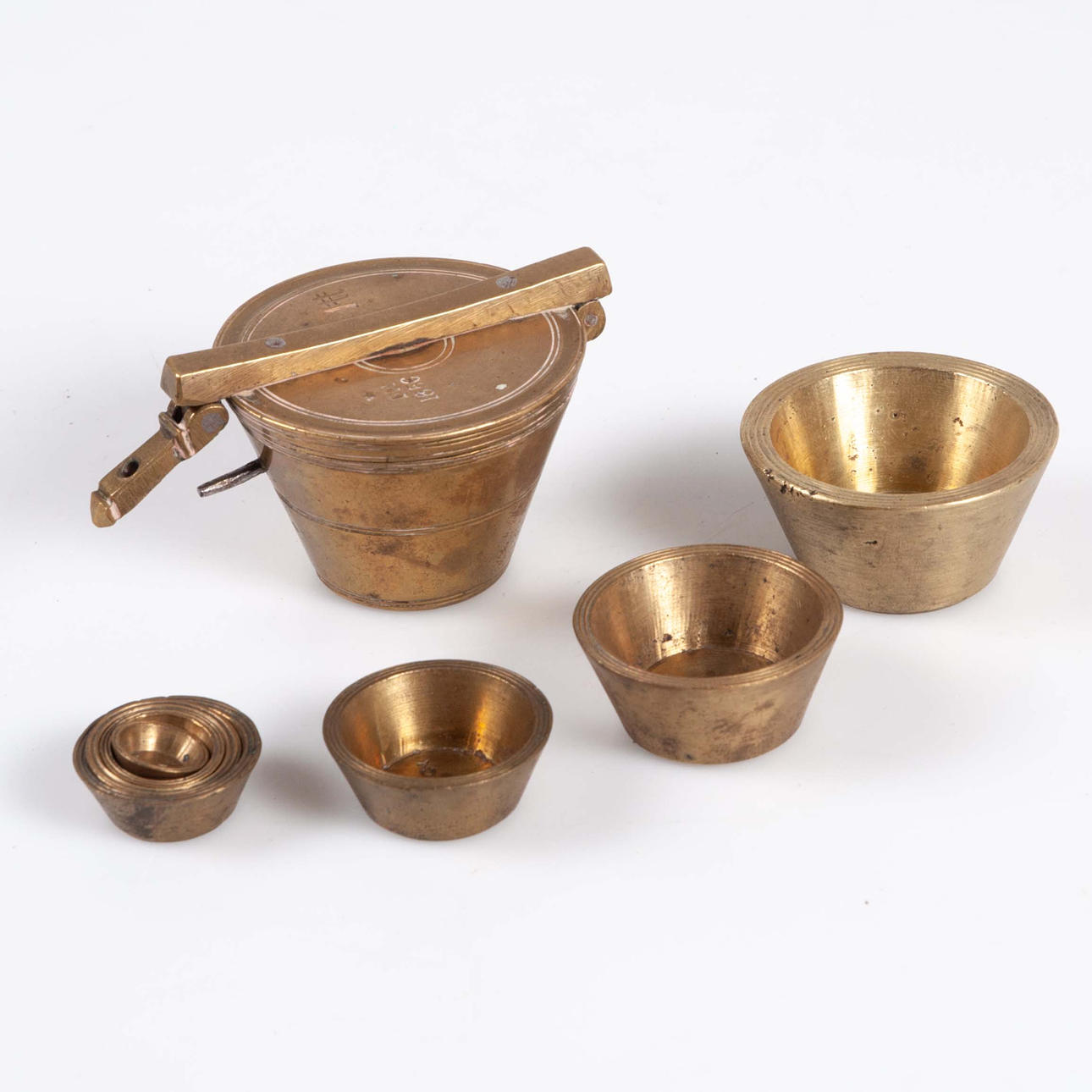 WEIGHT SET. Brass, 1886.