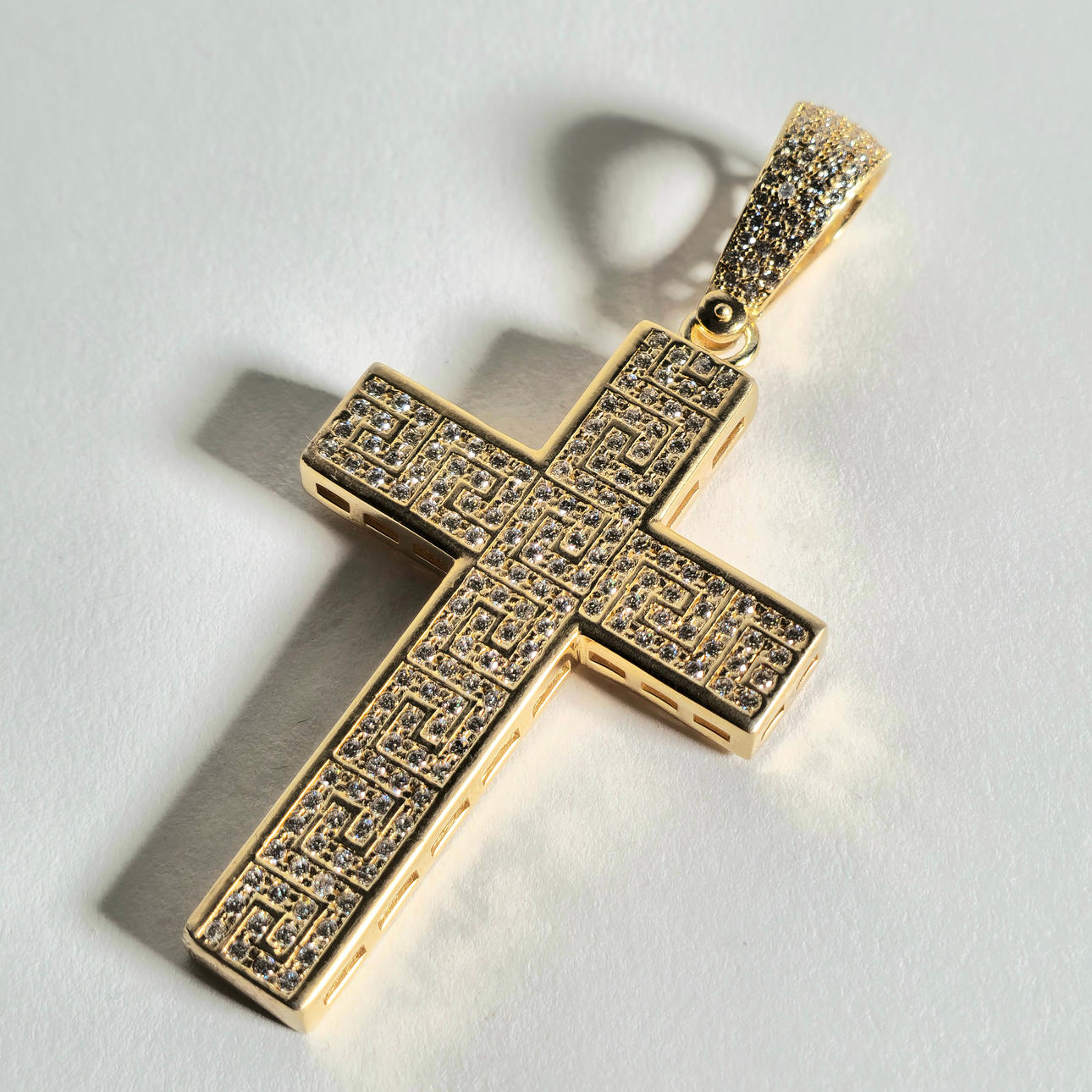 CROSS PENDANT IN SILVER PLATED WITH ZIRCONS.