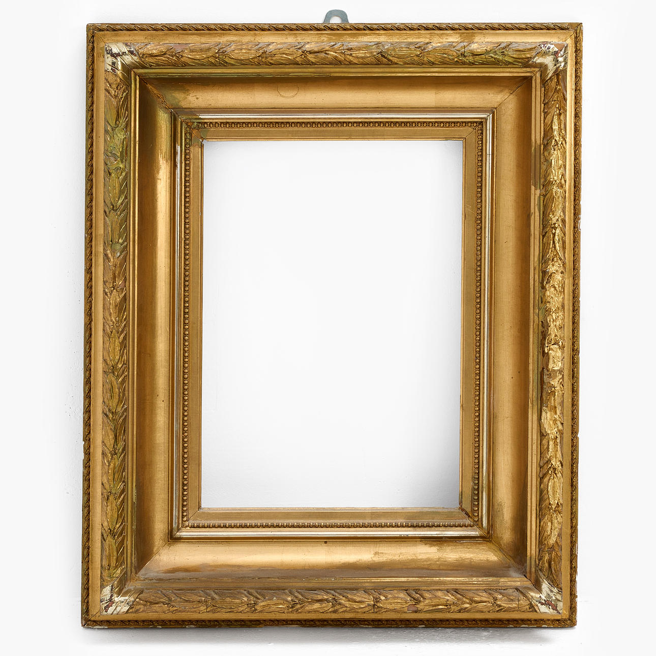 Frame, gilded and bronzed, decorated with a leaf border, second half of the 19th century.