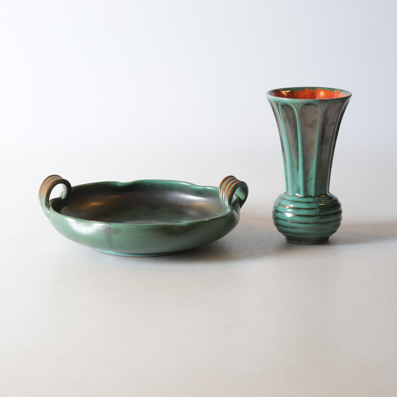 A vase & saucer, glazed earthenware, Ekeby, 20th century.