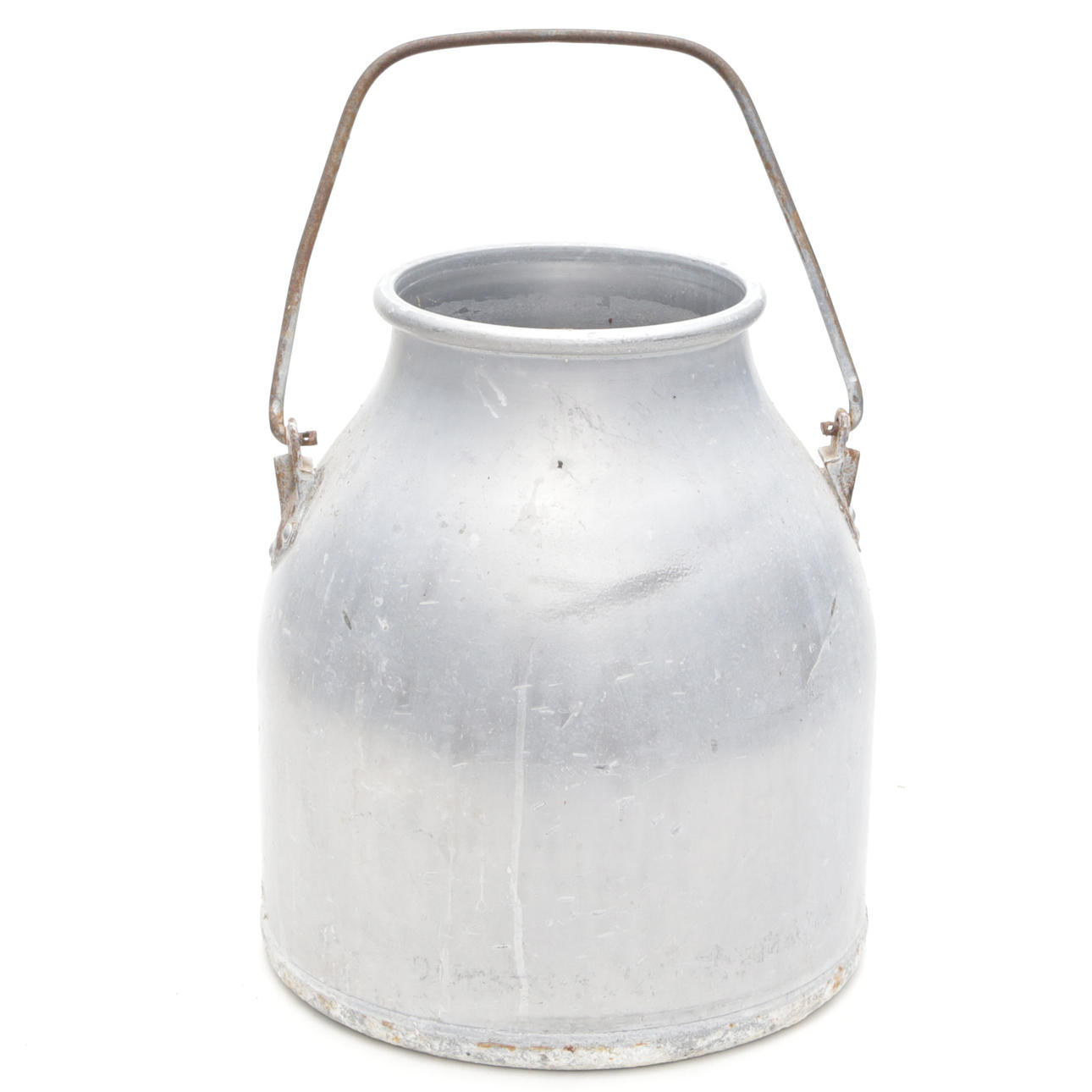 Una jarra metálica para leche.