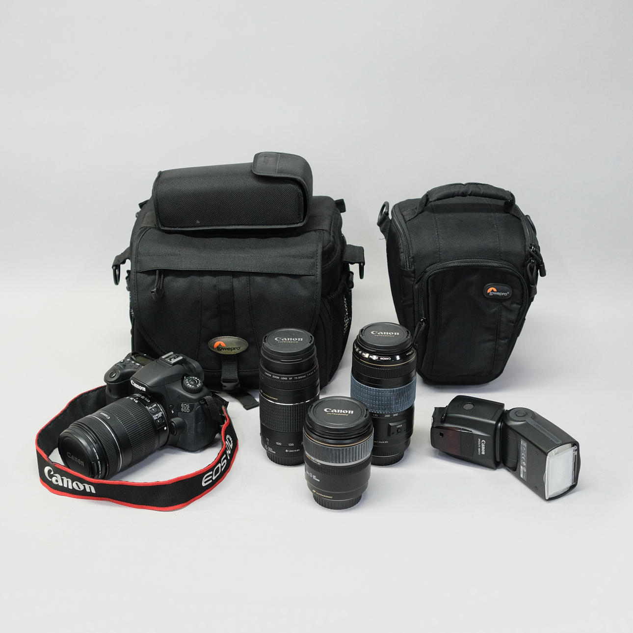 CANON. CAMERA BODY AND FOUR LENSES.