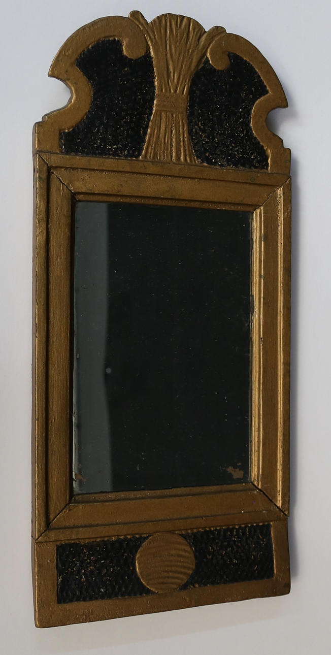 An early 19th century mirror, provincial work.