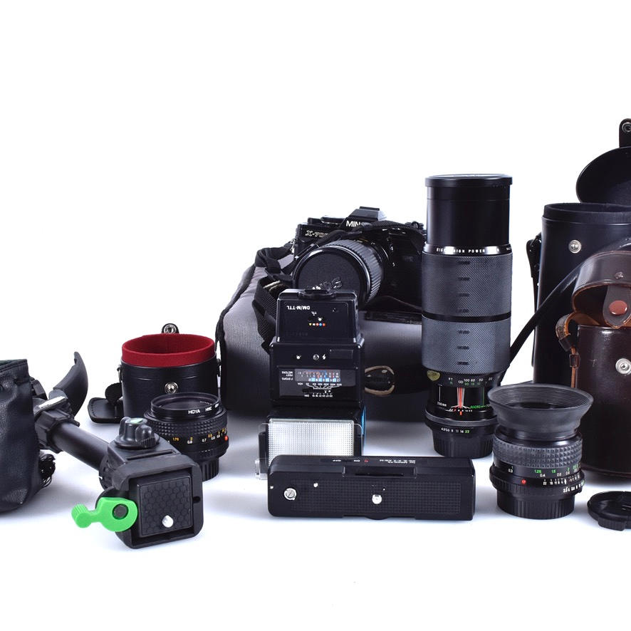 CAMERA with accessories, Minolta X700.