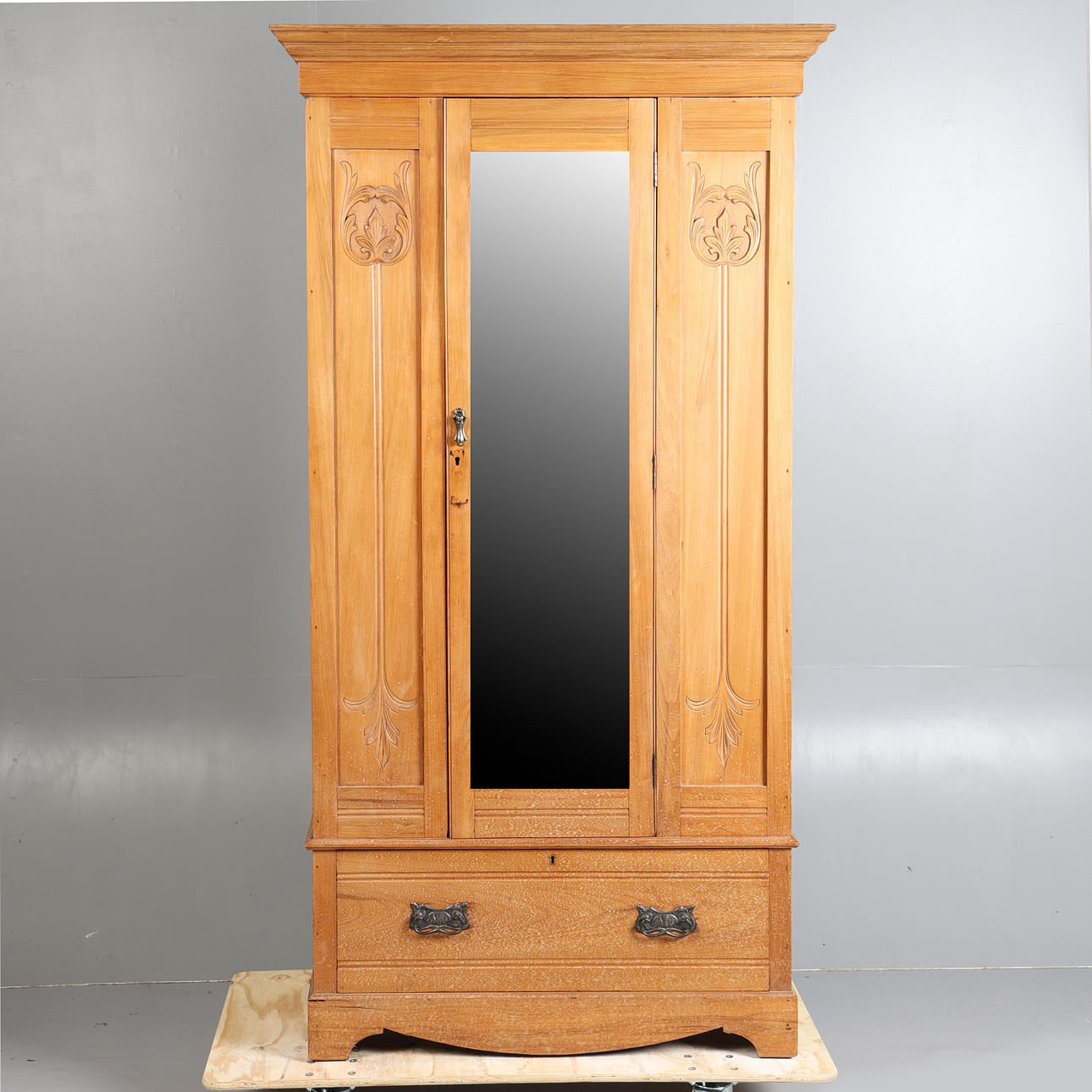AN ART NOUVEAU SATIN WALNUT WARDROBE.