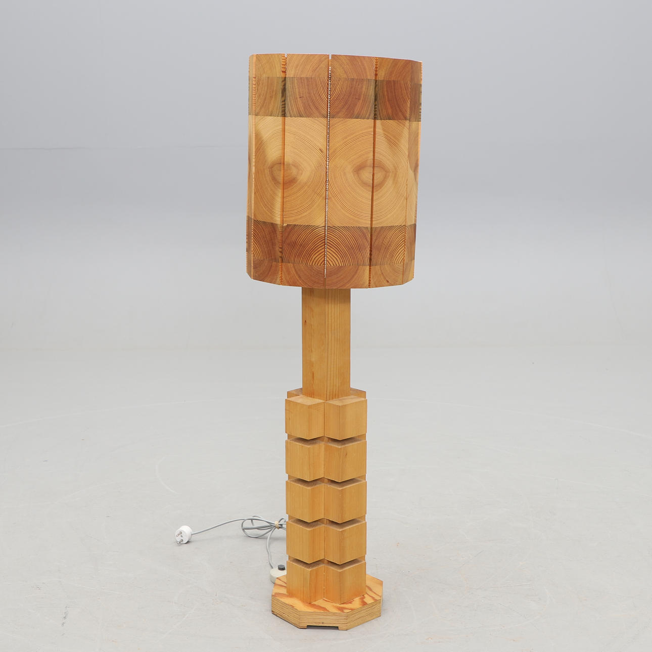 A 1970's pine floor lamp.