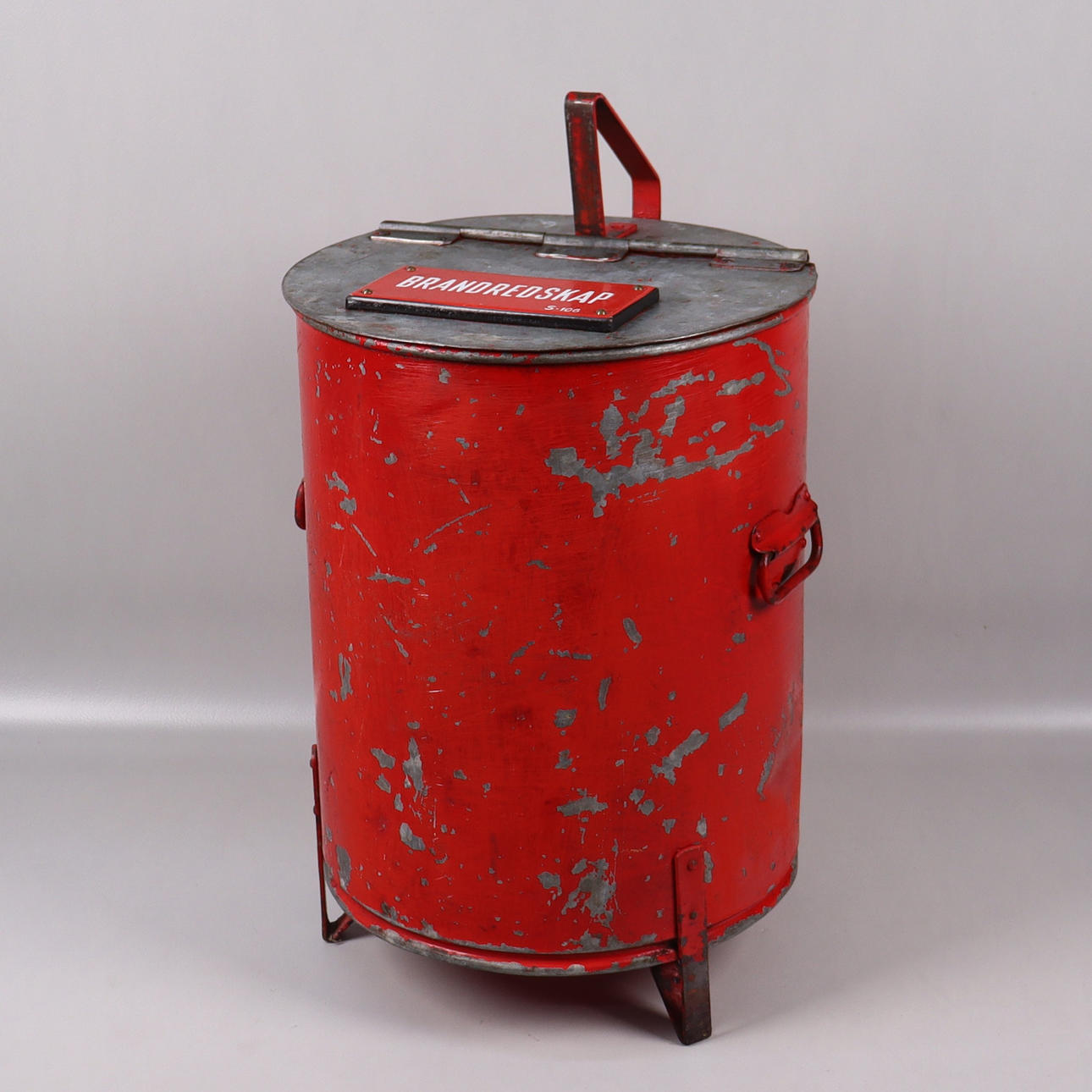 A metal fire bucket, 20th century.
