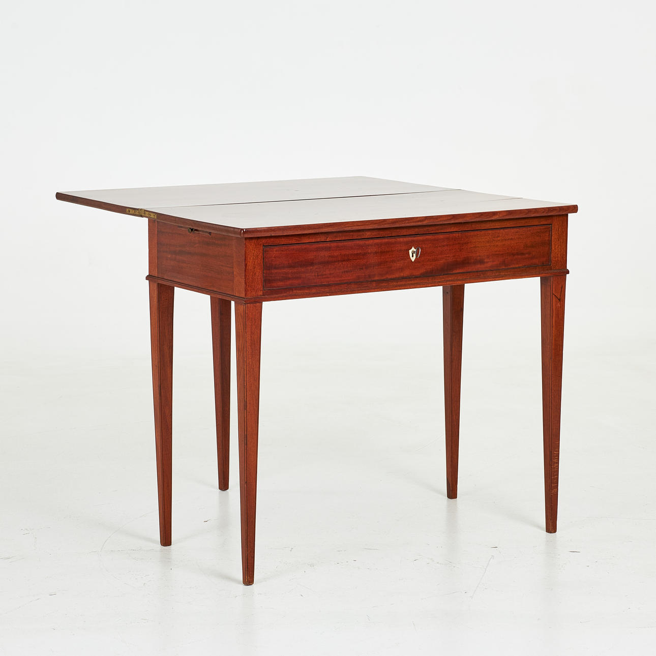 A 19th century mahogany gaming table.