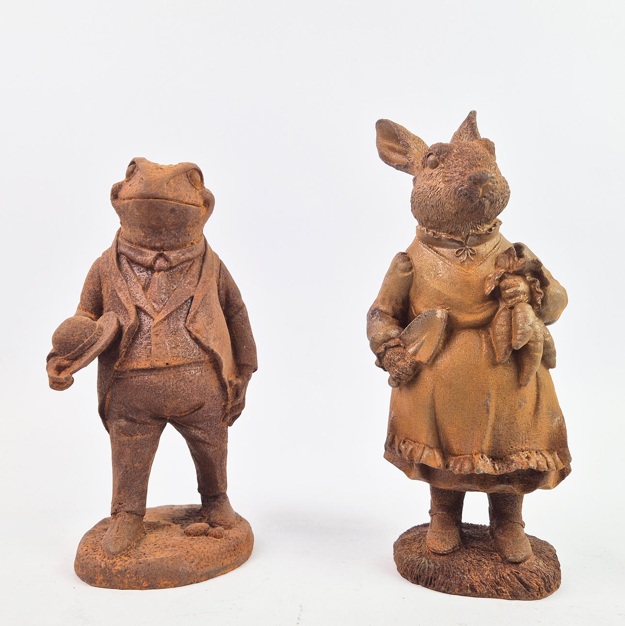 2 CAST METAL CHARACTERS, DIFFERING.