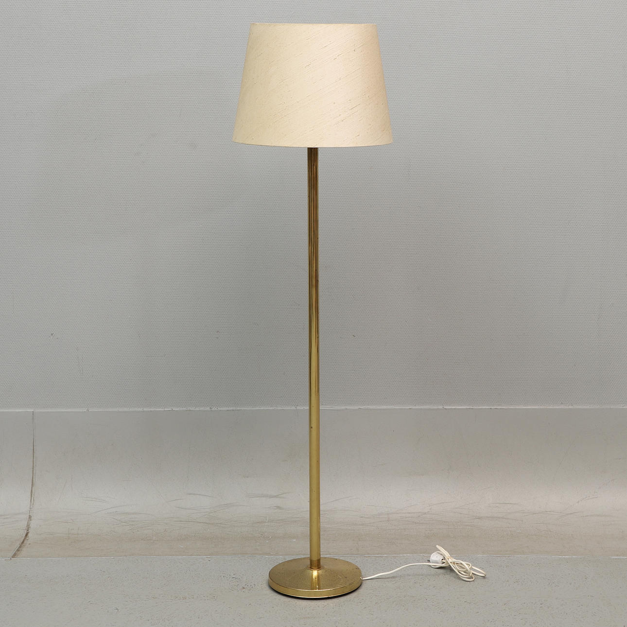 A 1970 ABO brass floor lamp.